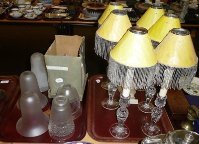 Lot 36 - A set of six cut glass light fittings with candle attachments and silvered tassel shades; seven...