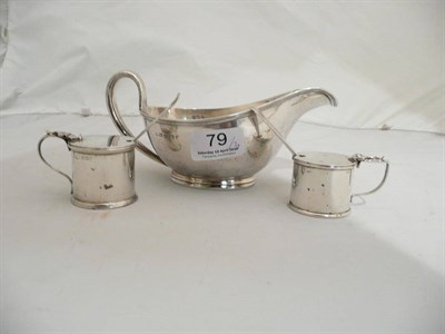 Lot 79 - Silver sauce boat and two silver mustard pots with blue glass liners and spoons