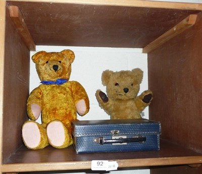 Lot 92 - Chad Valley teddy bear with growler, another larger and a small suitcase