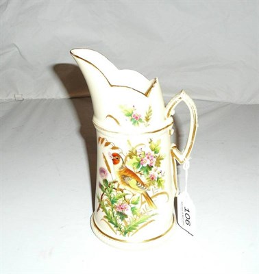 Lot 106 - A Royal Worcester gilded ivory tusk jug decorated with a bird and foliage in the style of Hopewell