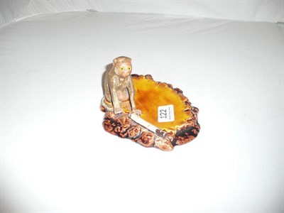 Lot 122 - A Bretby novelty ashtray, early 20th Century, modelled as a monkey with a cigarette.