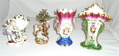 Lot 191 - A Meissen porcelain figure group - cherubs making arrows, a German figural vase and two Paris...