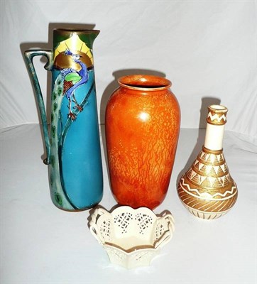 Lot 198 - Ruskin orange iridescent vase (af), Leeds creamware basket, an art nouveau peacock jug, and a...