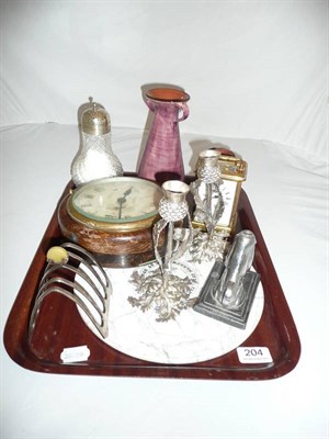 Lot 204 - A tray including a carriage clock, a marble cold meat tray, thistle candlesticks and sundry