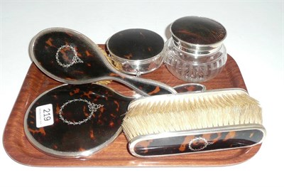 Lot 219 - Silver & tortoiseshell backed dressing table set