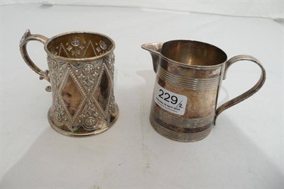 Lot 229 - Silver christening mug and a jug