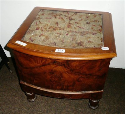 Lot 233 - A Victorian burr walnut bow front commode