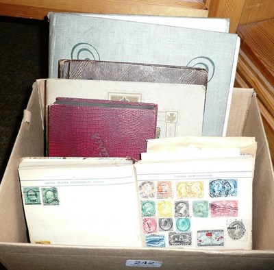 Lot 242 - Two albums and a quantity of loose stamps and cigarette cards