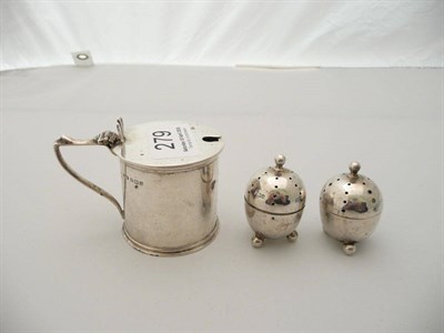 Lot 279 - A silver mustard and a pair of silver peppers