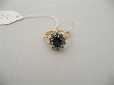 Lot 281 - Diamond and sapphire 18 carat gold ring