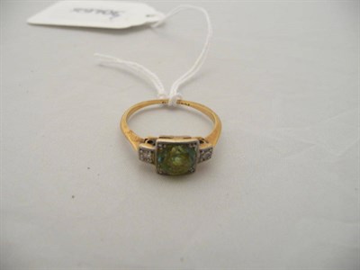 Lot 286 - A zircon and diamond three stone ring