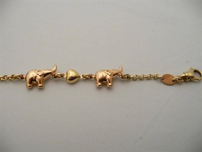 Lot 299 - A two colour elephant motif bracelet stamped '750', 8.0g approx