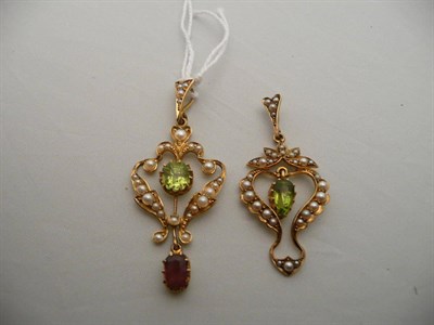 Lot 312 - A peridot and seed pearl pendant stamped '15' and a peridot, seed pearl and pink tourmaline pendant