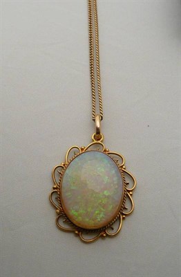 Lot 325 - An opal pendant on chain, chain stamped '9CT'