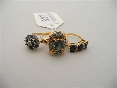 Lot 327 - A 9 carat gold sapphire and diamond cluster ring, a sapphire and diamond ring stamped '18K' and...