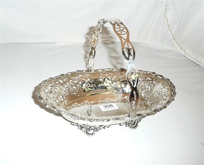 Lot 356 - Silver pierced basket with swing handle