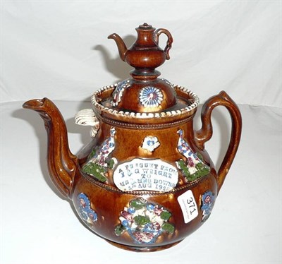 Lot 371 - A Measham ware teapot