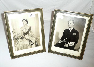 Lot 382 - A pair of tooled leather framed photographs with the Queen and Prince portraits