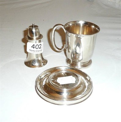 Lot 402 - Silver 'lighthouse' lighter with circular base and a silver mug