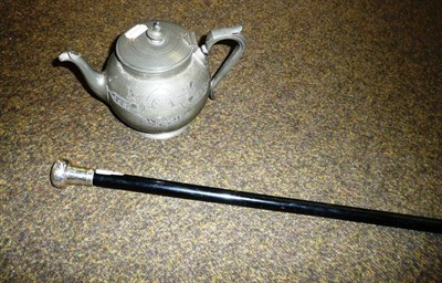 Lot 418 - An ebonised walking cane with silver pommel, Chester 1923 and a Victorian pewter teapot