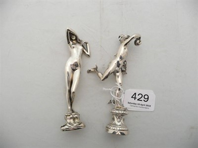 Lot 429 - A white metal hand seal modelled as Mercury; and a similar hand seal as a nude maiden (2)