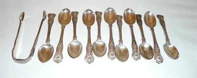 Lot 438 - A set of eleven Victorian silver King's pattern teaspoons and a pair of sugar tongs