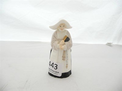 Lot 443 - A Royal Worcester candle snuffer - 'Nun'