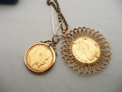 Lot 453 - A gold sovereign 1904 in frame and another 1973 in frame with chain