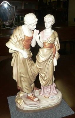 Lot 500 - Modern Royal Dux group of two young lovers smelling a flower, in gilt