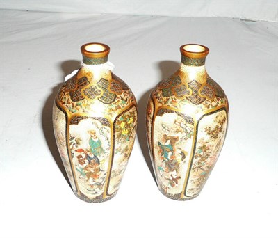 Lot 513 - A pair of Japanese Satsuma earthenware small ovoid vases