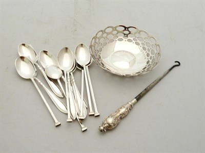 Lot 533 - Silver pierced dish, two sets of teaspoons and a button hook