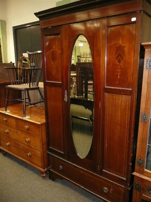 Lot 646 - An Edwardian mahogany wardrobe and a Victorian mahogany four height chest and a Victorian...