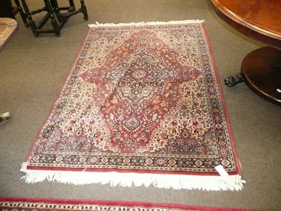 Lot 671 - Small machine woven rug