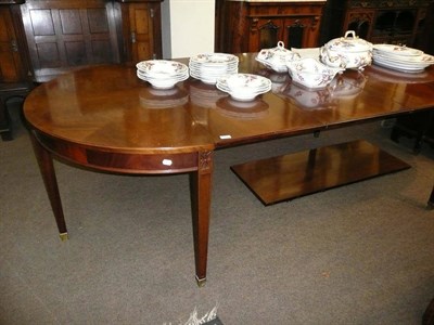 Lot 672 - George III style D-end dining table with four additional leaves