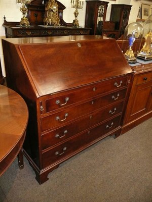 Lot 673 - Georgian mahogany bureau