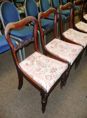 Lot 690 - A set of five Victorian mahogany buckle back dinning chairs