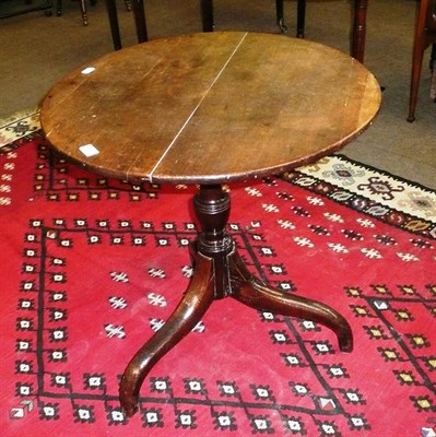 Lot 697 - Oak tripod table