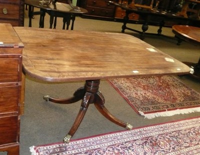 Lot 702 - A Regency mahogany rectangular tip-top breakfast table