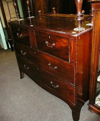 Lot 705 - A late George III three height chest with angular brass handles