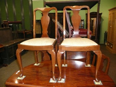 Lot 717 - Walnut sideboard, set of four dining chairs and a nursing chair