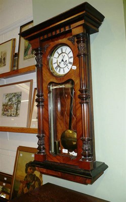 Lot 741 - A walnut Vienna style wall clock