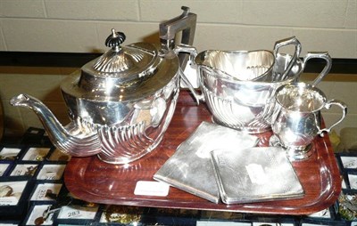 Lot 44A - Two silver engine turned cigarette cases, silver tongs, silver Christening mug, three piece...
