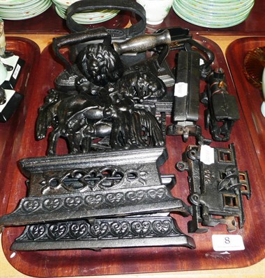 Lot 8 - Cast iron flat irons, cast iron fireside ornaments, etc and an Art Nouveau hand beaten fender