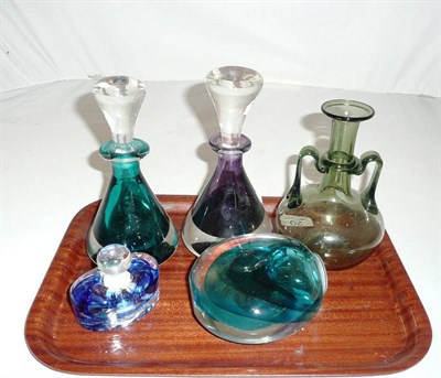 Lot 20 - Two signed coloured glass scent bottles, another, a small candle holder and a green glass vase