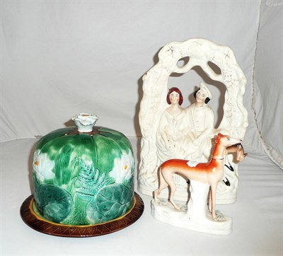 Lot 39 - Staffordshire greyhound, flatback figure and a Majolica cheese bell