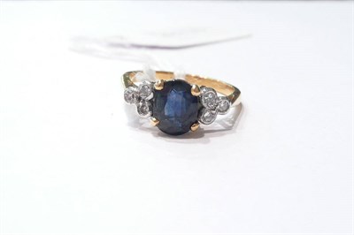 Lot 47 - Sapphire and diamond set ring