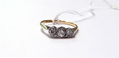 Lot 58 - A three stone diamond ring