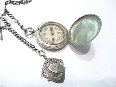 Lot 62 - A cased compass and silver watch chain