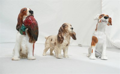 Lot 91 - Two Royal Doulton dog figures and a cold painted dog figure