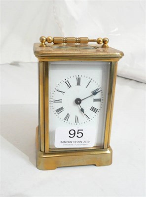 Lot 95 - A brass carriage timepiece and fitted case